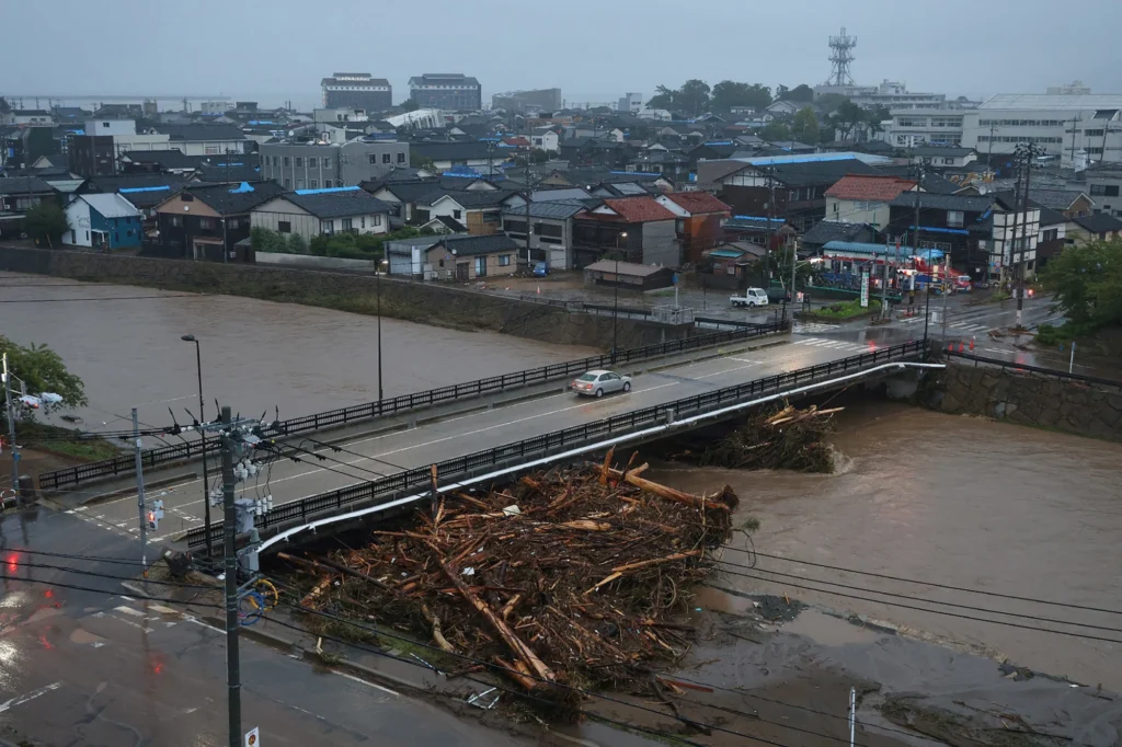 This Japanese region is still recovering from a deadly earthquake. Now record rains have flooded its streets