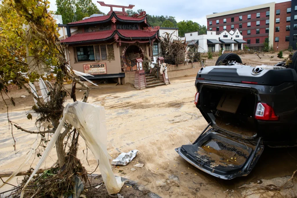 People moved to Asheville to escape extreme weather. They forgot its tragic history.(CNN NEWS)_